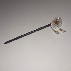 Elegant Black Hair Stick with White Floral Accent